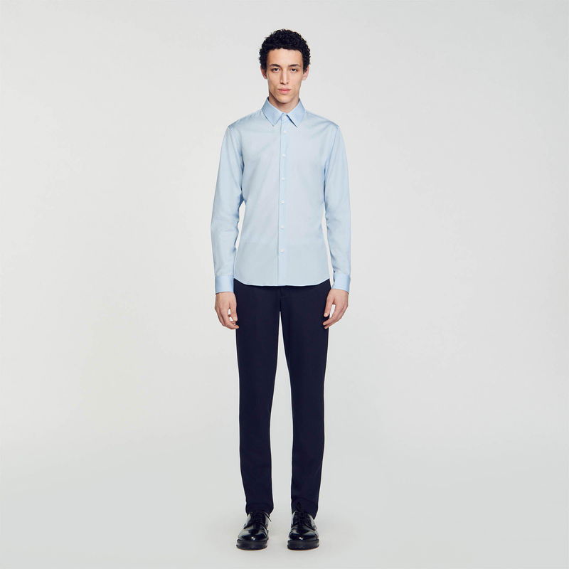 Light blue SANDRO shirt with a man wearing it.