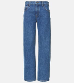 Wide-leg, dark-wash denim jeans with a visible button fly.