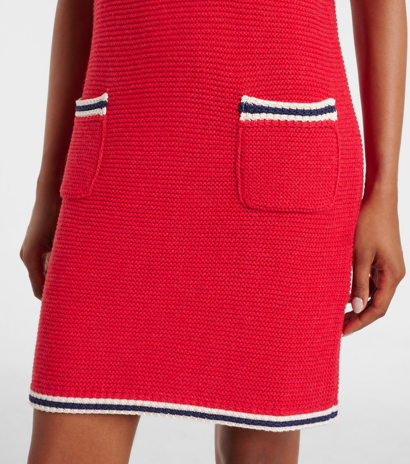 Red knitted midi skirt with white trim and pockets