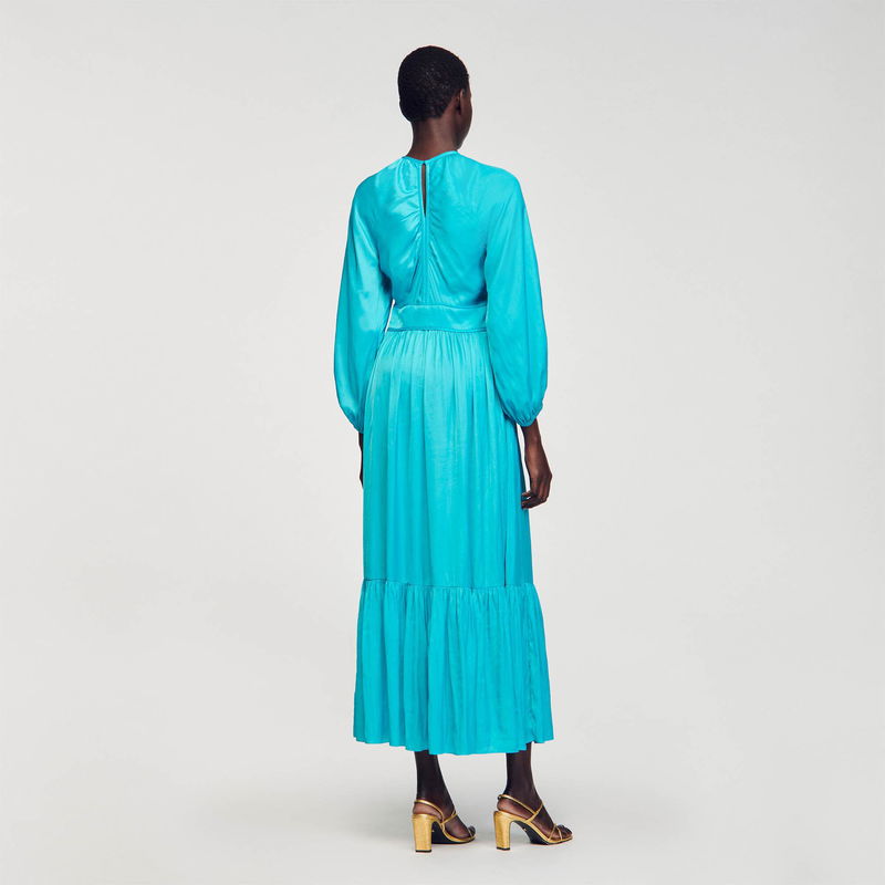 Satin blue maxi dress with puffed sleeves.