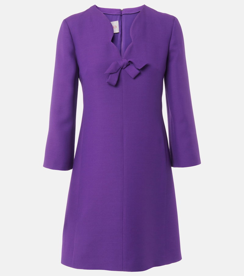 Purple velvet dress with a bow neckline
