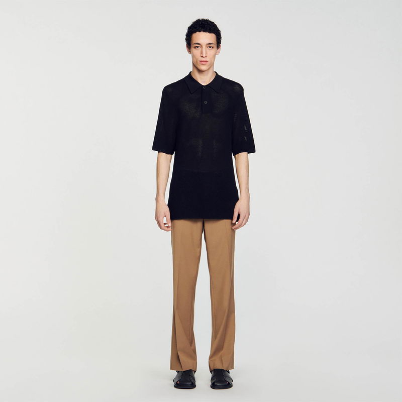 Black open-knit polo shirt with a man wearing it.