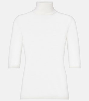 Cream-colored, short-sleeved turtleneck sweater
