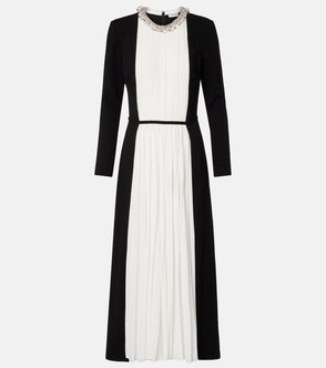 Black and white pleated dress with a beaded neckline.
