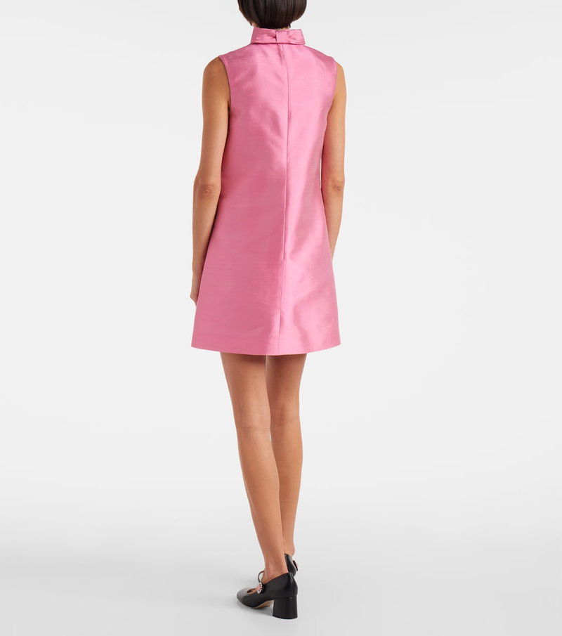 Pink satin sleeveless dress with a bow neck detail