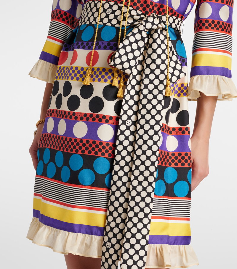 Colorful, patterned wrap dress with polka dots and tassels