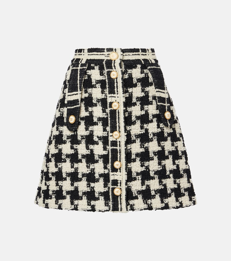 Black and white tweed skirt with gold buttons and Valentino logo