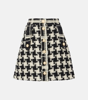 Black and white tweed skirt with gold buttons and Valentino logo