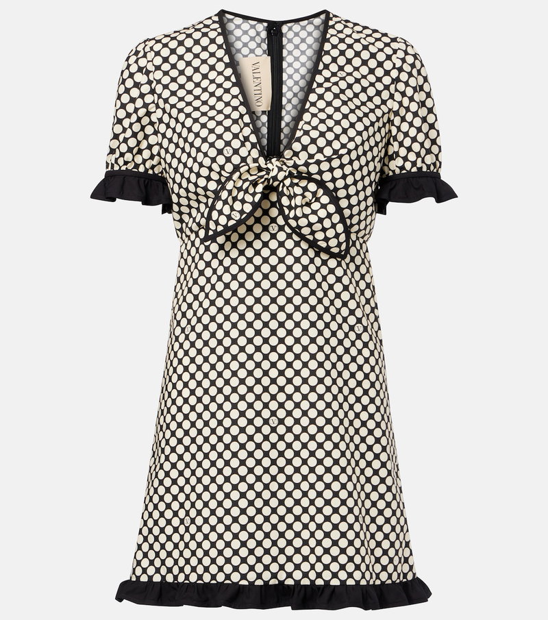 Valentino polka-dot wrap dress with a tie neckline and ruffled hem.