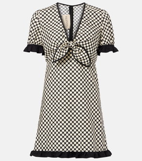 Valentino polka-dot wrap dress with a tie neckline and ruffled hem.