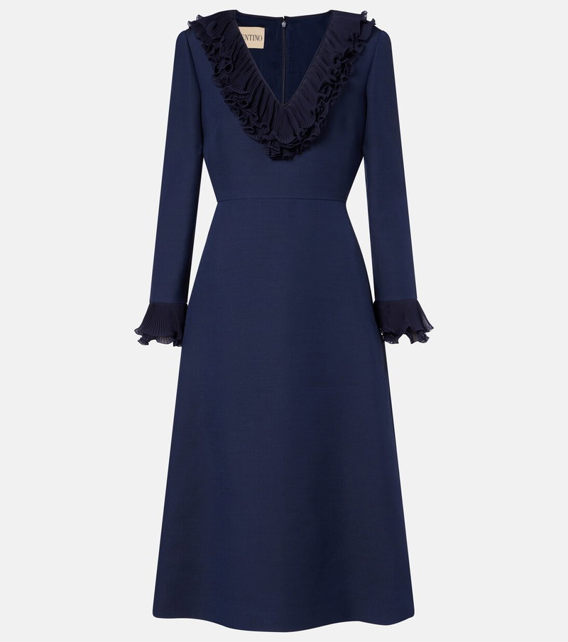 Navy dress with a ruffled neckline and pleated sleeves