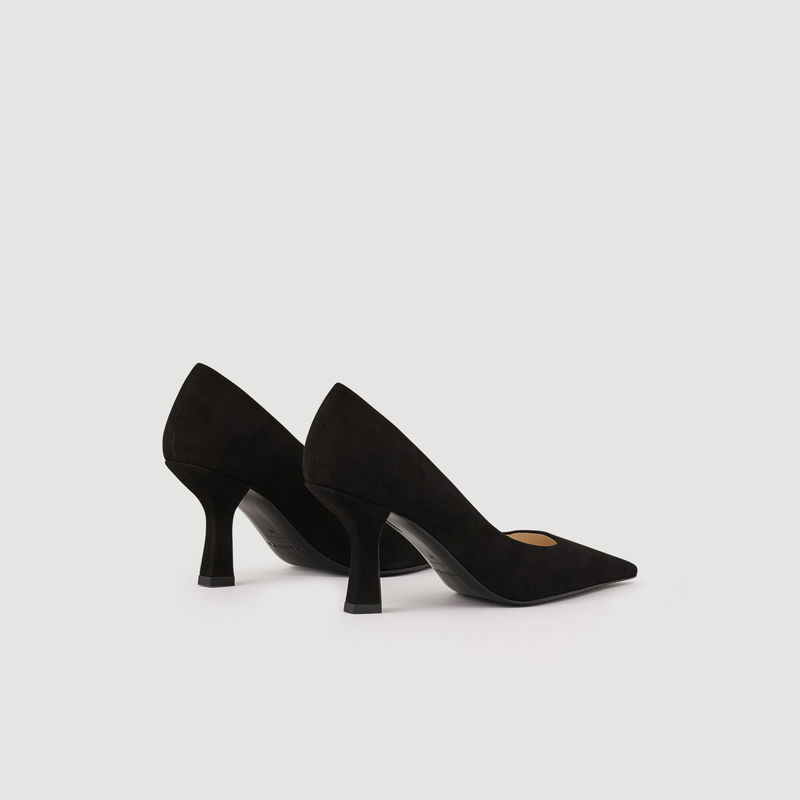 Black suede pumps with a pointed toe.