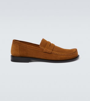 Brown suede loafers with a black sole