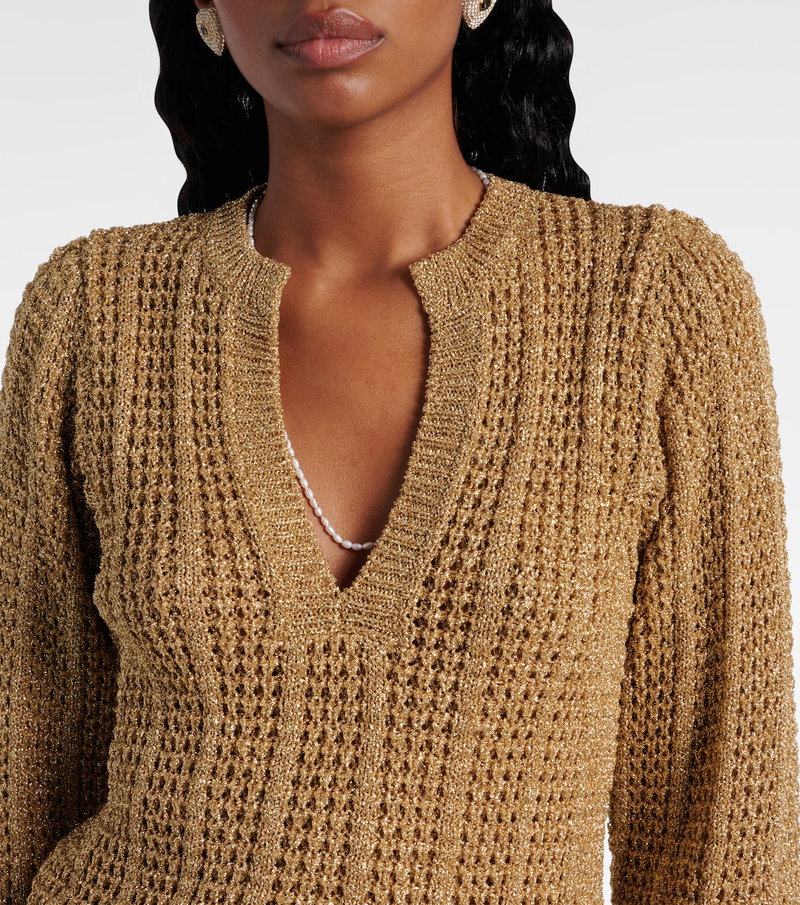 Gold-threaded, open-neck sweater on a model