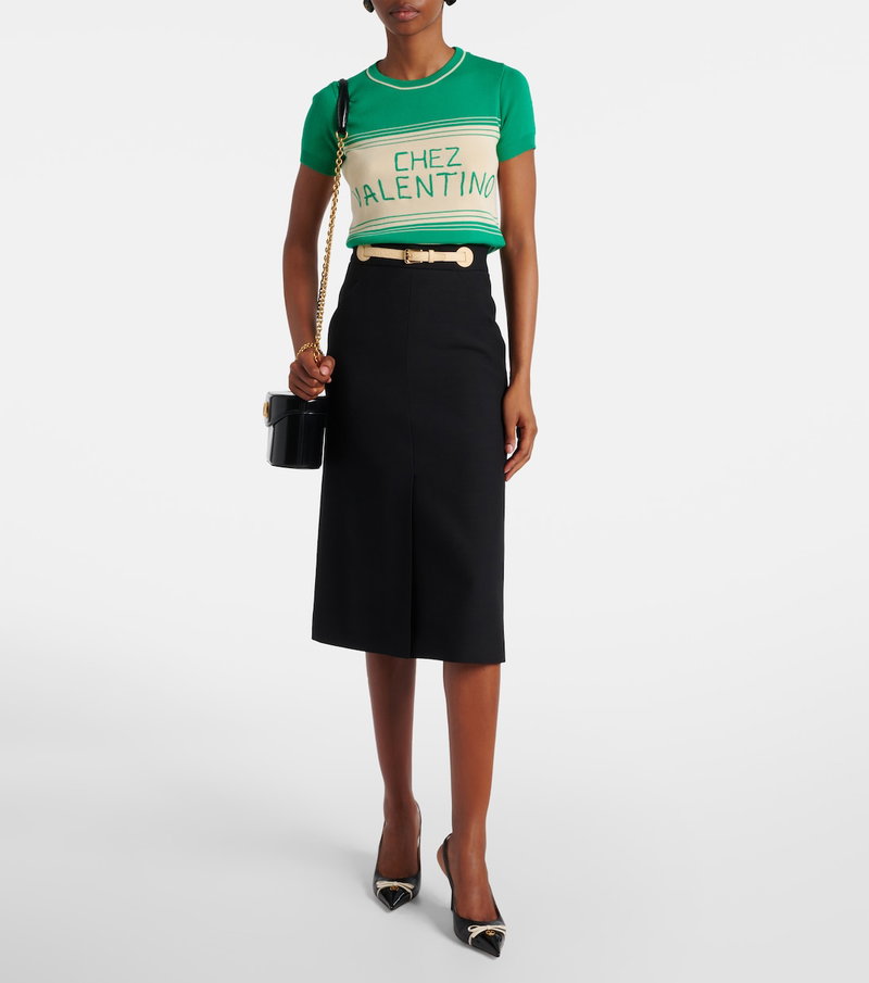Valentino green and white striped t-shirt with belt and black pencil skirt.