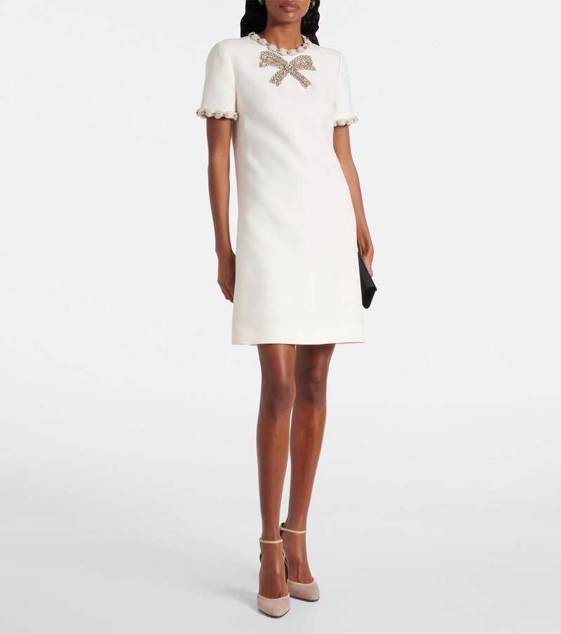 White dress with embellished bow neckline