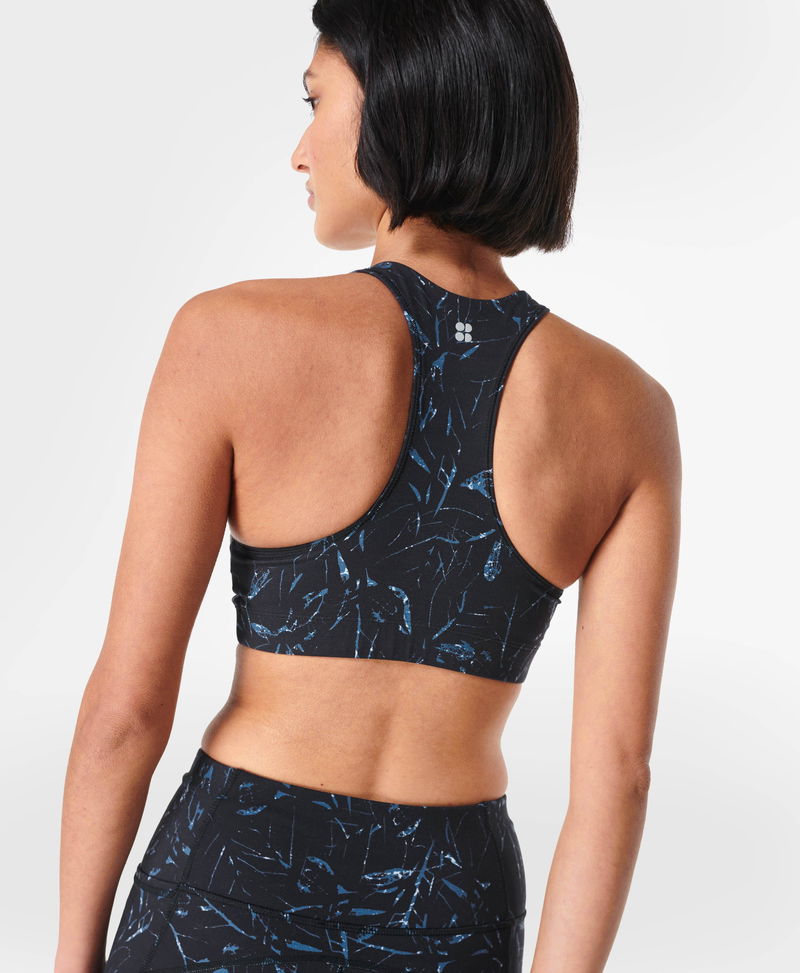 SWEATY BETTY Super Soft Workout Bra in Black Leaf Texture Print