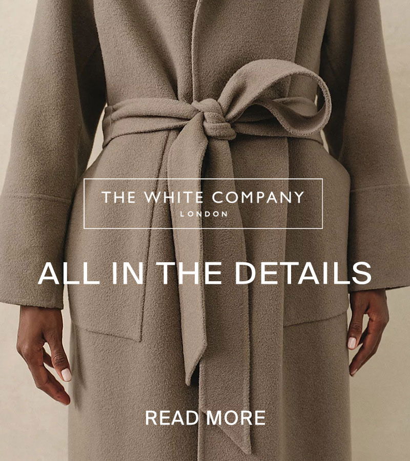Close up of beige coat, the white company all in the details, read more
