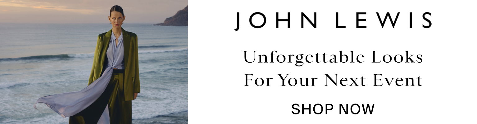 Woman on beach in formal outfit