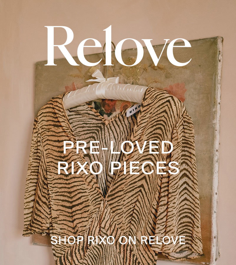 Tiger print dress hanging on painted canvas