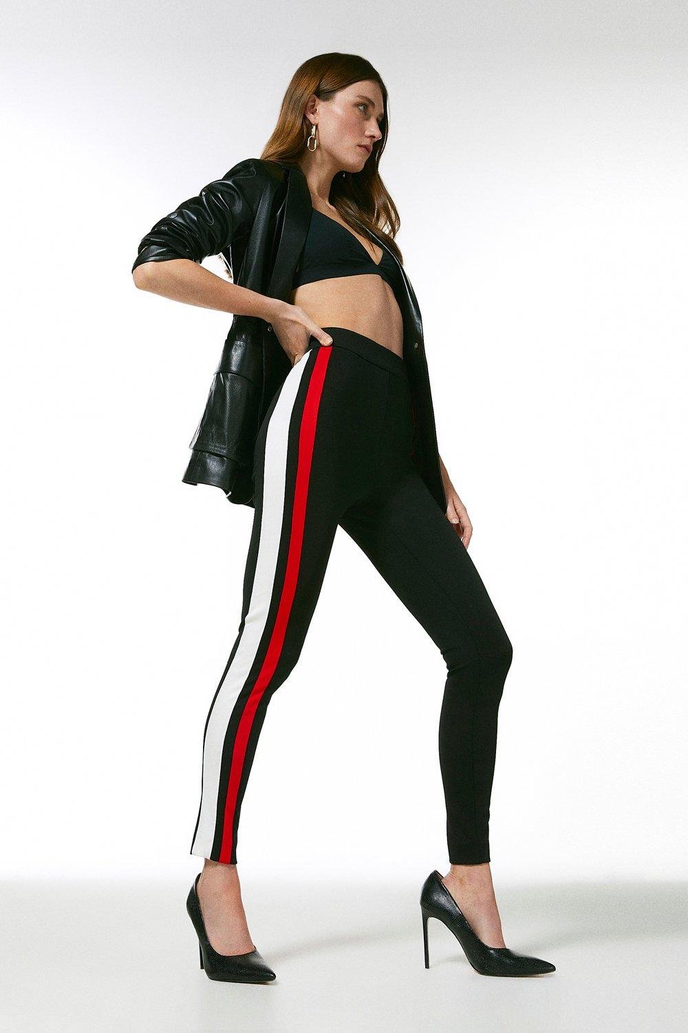 OFF-WHITE Off Stamp striped stretch-jersey leggings